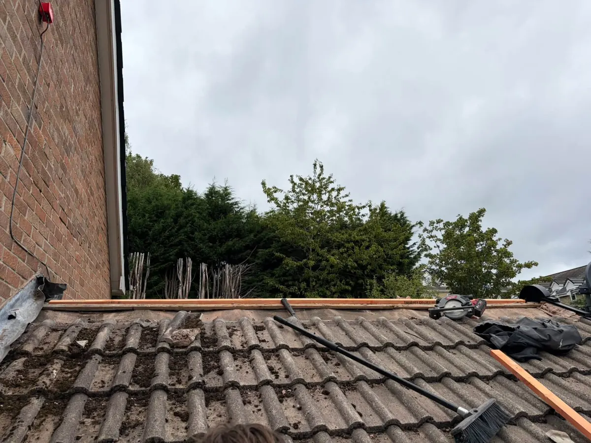Ridge area being prepared before the new system was fitted